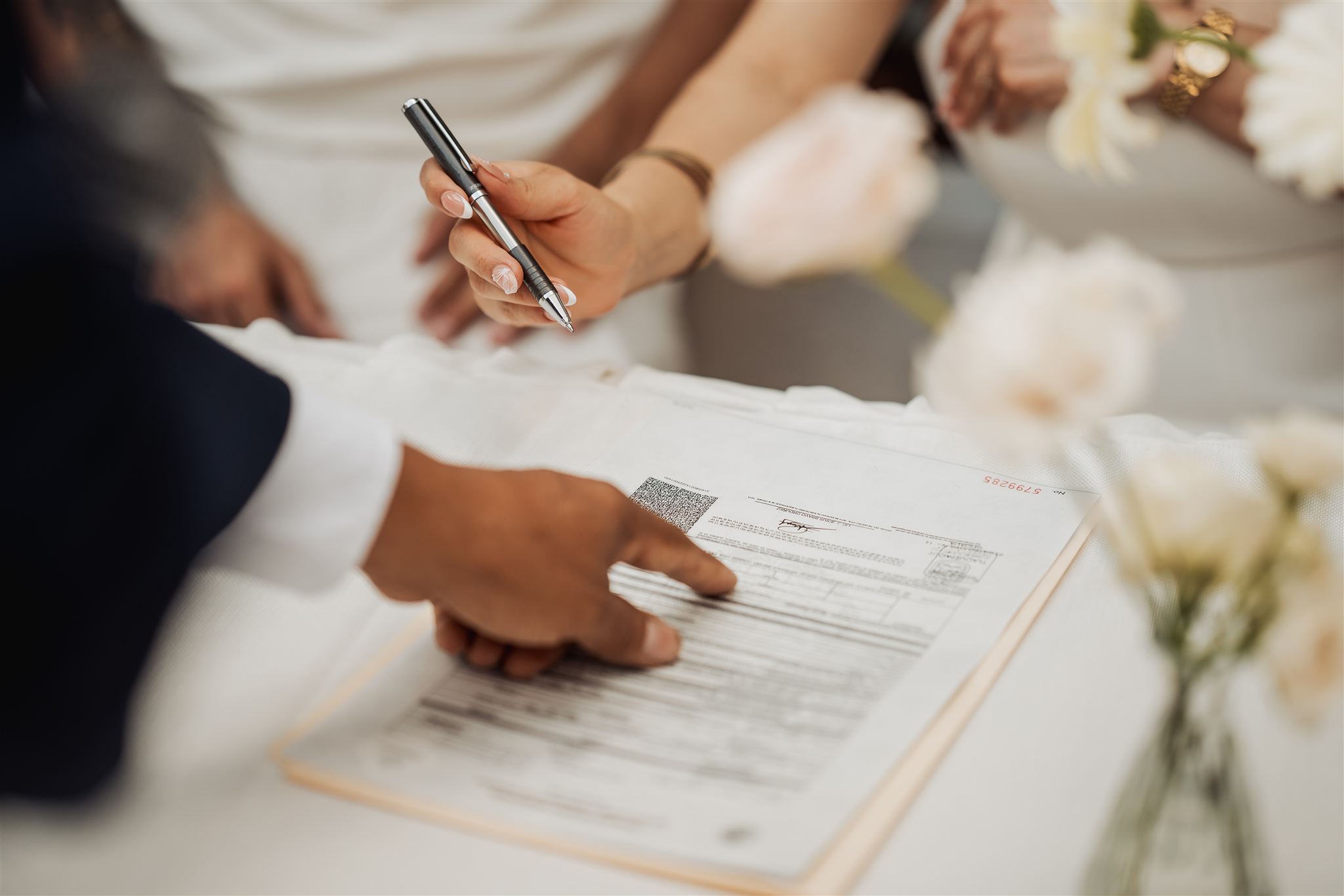 Bride getting ready in elegant white dress